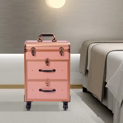Valise de maquillage à roulettes dorée